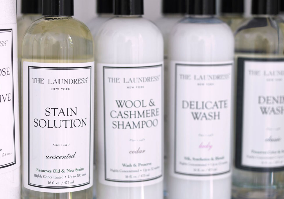 the laundress bottles on a shelf
