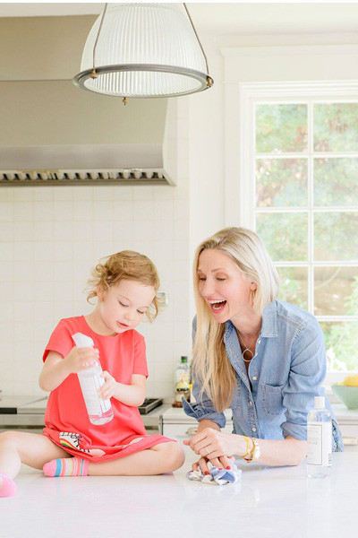 woman and kid cleaning