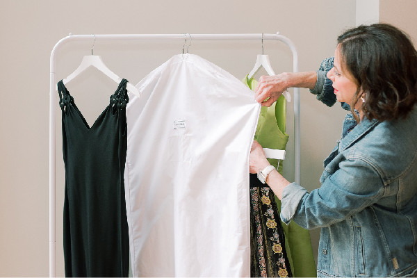 wendy hanging garments up