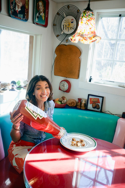 mary giuliani with tiny hot dogs