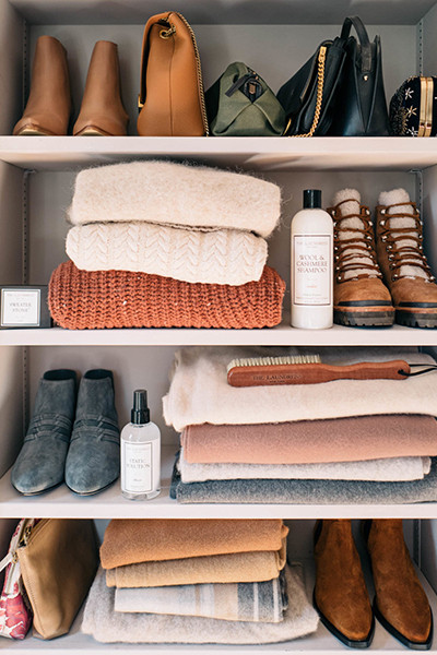 sweaters and boots on shelves