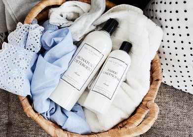 2 laundress products in a basket of clothes